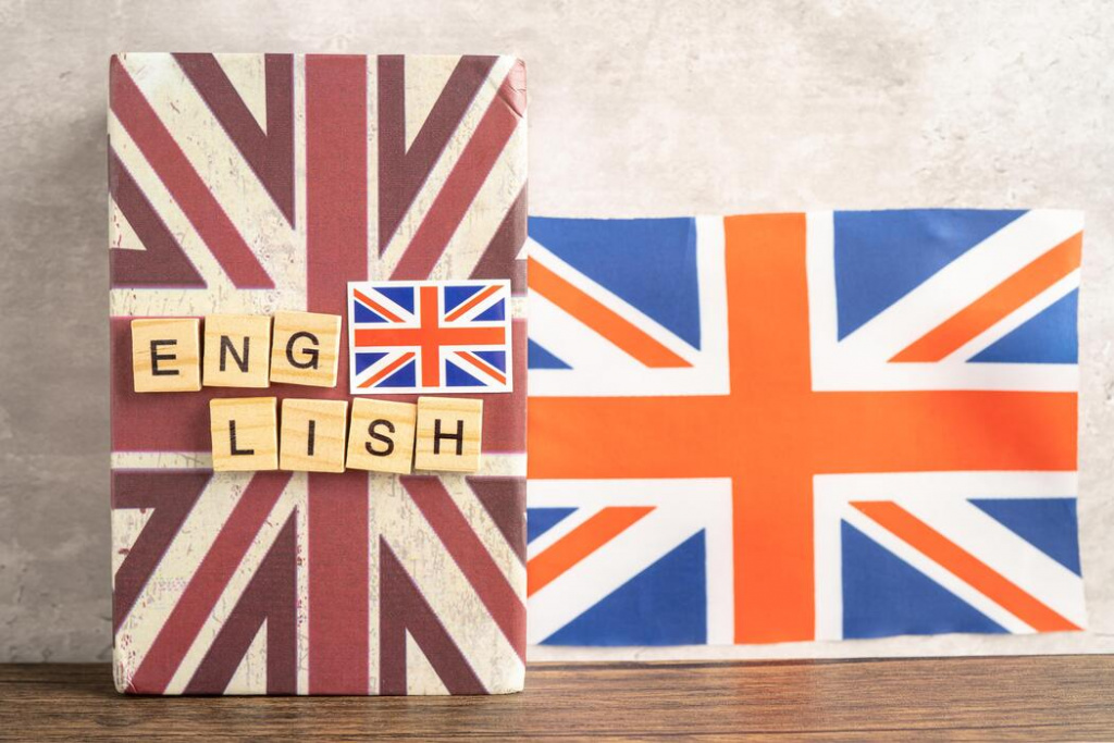 word-english-on-book-with-united-kingdom-flag-learning-english-language-courses-concept-photo.jpg
